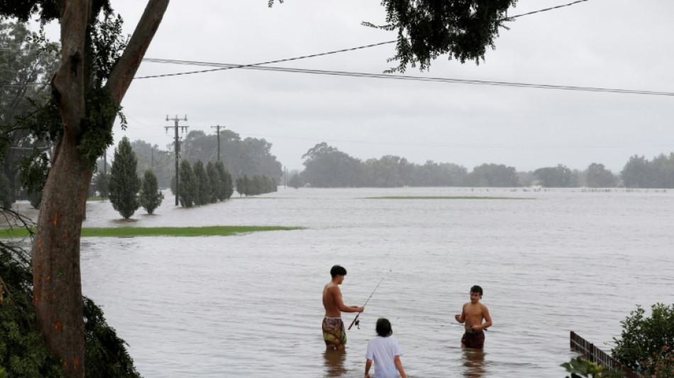 Australia orders 200,000 to flee floods, city of Sydney spared