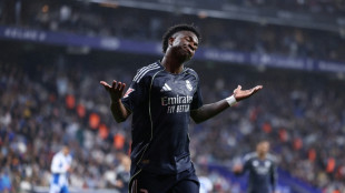 Vinicius double delays Barca title as Real Madrid down Espanyol