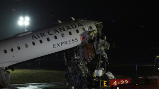 Plane, fire truck collide on runway at New York's LaGuardia Airport