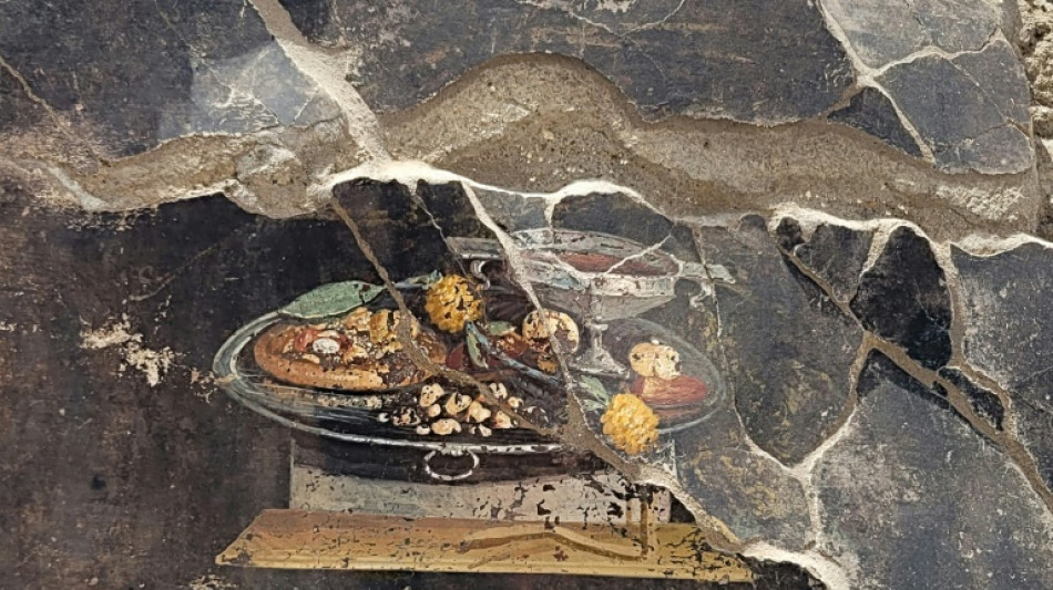 Une fresque avec une "pizza" d&eacute;couverte &agrave; Pomp&eacute;i, il manque juste la mozzarella