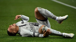 Mbappe misses penalty, comes off injured in PSG win