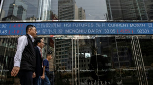 World stocks mostly slide, consolidating Fed-fuelled gains