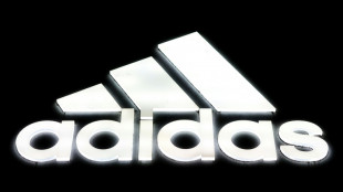 Adidas hikes profit forecast as contains US tariff impact