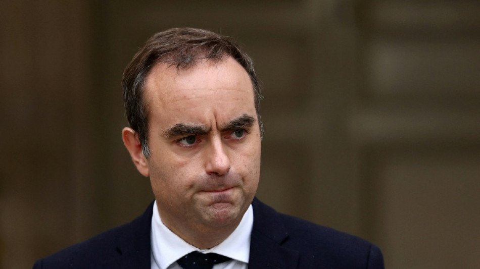 Reappointed French PM scrambles to form government