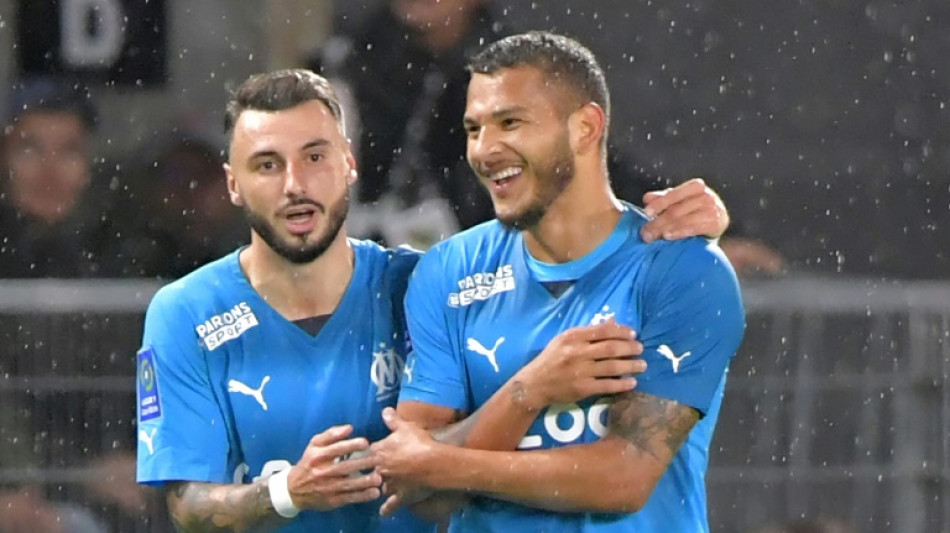 Clauss delivers as Marseille beat Angers climb to top of Ligue 1
