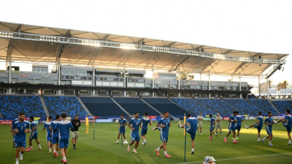 Iran take center stage at World Cup as Spain make bow
