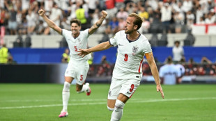 Kane double fires England World Cup bid as Ronaldo's Portugal stumble 