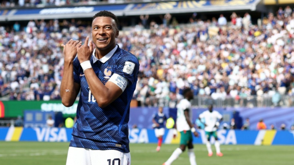 France and two-goal Mbappe roar into World Cup