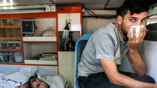 First wounded and foreigners escape war-torn Gaza for Egypt