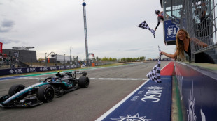 Antonelli wins US Grand but title triumph has to wait another week