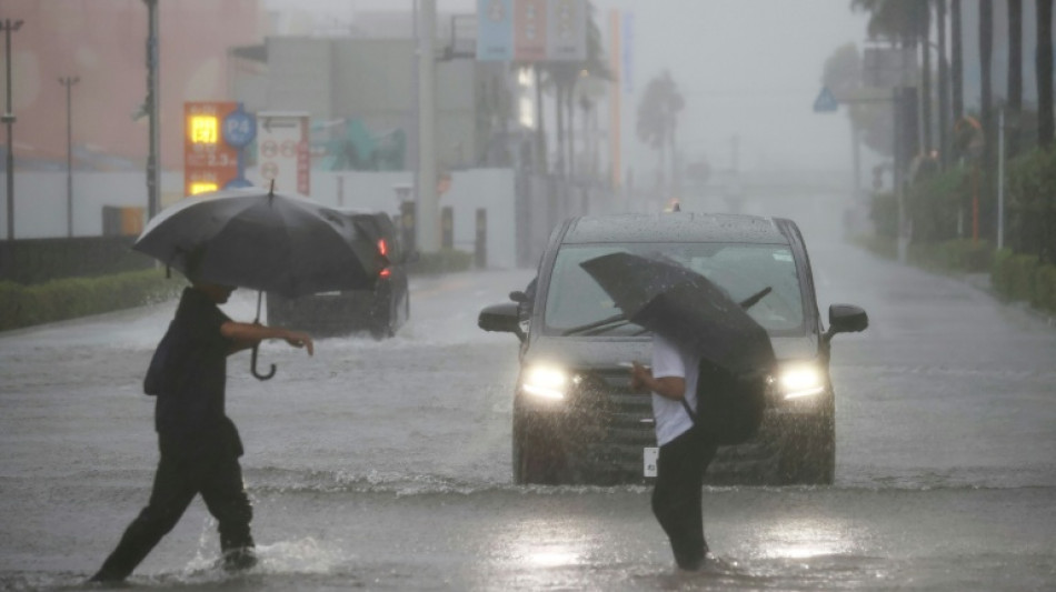 Flights scrapped, evacuations urged as Typhoon Dujuan wallops Japan