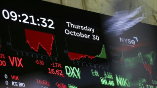 Wall Street termine en baisse, lest&eacute;e par la tech et la Fed