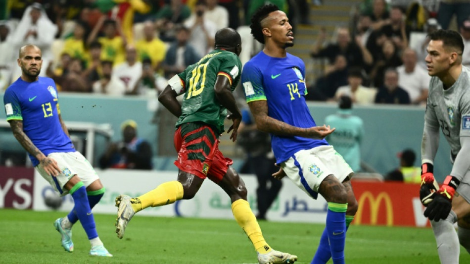 Cameroon stun Brazil but go out of World Cup
