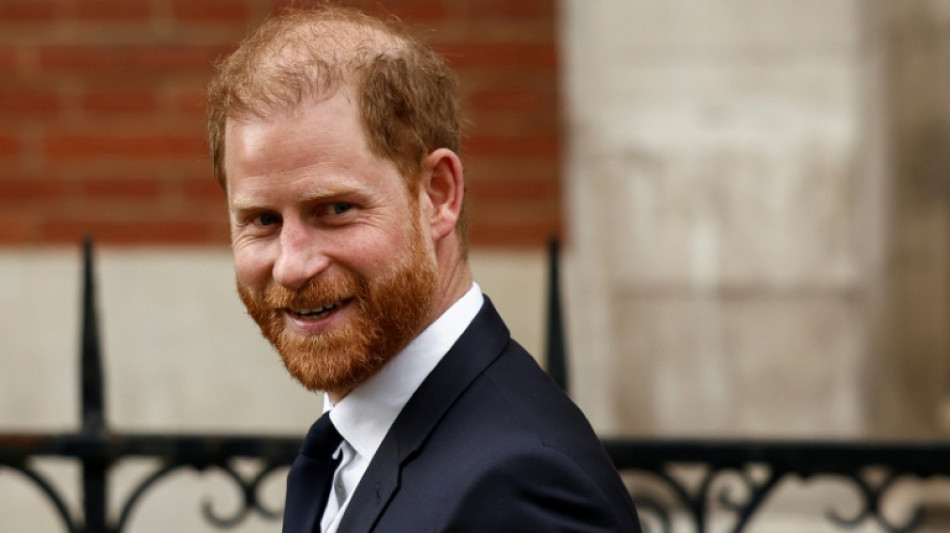 Prince Harry accuses tabloids of making wife's life 'absolute misery'