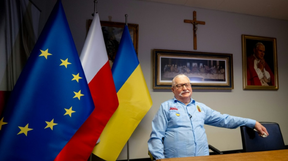 Trump either a 'traitor' or 'exceptional', Nobel-winner Walesa tells AFP