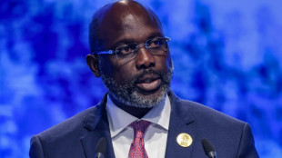 Liberian president's long stay abroad criticised