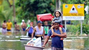Philippines evacuates one million, woman dead as super typhoon nears