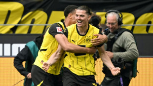 Borussia Dortmund vence Kiel (3-0) e conquista última vaga na Liga dos Campeões