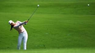 Injured Chun takes control in Singapore