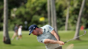 Defending champ Nick Taylor tied for lead at Sony Open