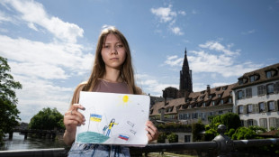 Prisi&oacute;n, separaci&oacute;n y exilio: padre e hija rusos marcados por un dibujo antiguerra