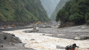 Nepal orders rescuers to safety as overflow brings new flood risks